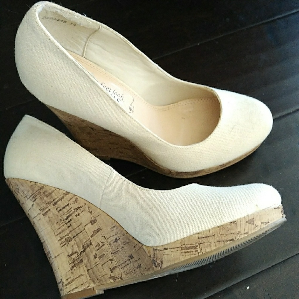 More of an off white / creamy white heels.